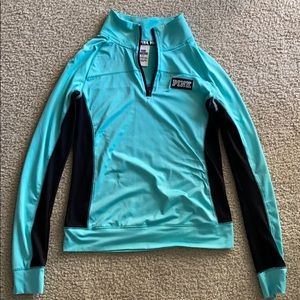 Black and blue quarter zip from pink